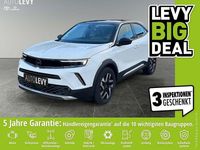 Gebraucht Opel Mokka-e Elegance 100 kW (136 PS) 2023 Lack weiss banquise/typ aussenverkleidun (metallic) SUV