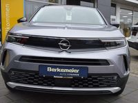 Gebraucht Opel Mokka-e Elegance 100 kW (136 PS) 2022 Kontrast grauquarz silber (metallic) SUV