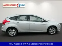 Używany Ford Focus 125 KM (91 kW) 2014 Srebrny Sedan/Limuzyna