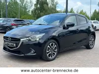 Używany Mazda 2 Nakama 90 KM (66 kW) 2016 Czarny Sedan/Limuzyna
