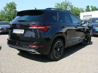 Gebraucht Skoda Karoq SportLine 190 PS (139 kW) 2023 Schwarz metallic SUV