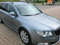 Używany Skoda Superb 140 KM (102 kW) 2012 Niebieski Kombi
