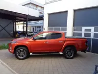Gebraucht Mitsubishi L200 Top 150 PS (110 kW) 2021 Zirkonorange Pickup