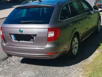 Gebraucht Skoda Superb 140 PS (102 kW) 2011 Violett Kombi