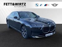 Gebraucht BMW 750e 489 PS (359 kW) 2024 Sophistograu brillanteffekt metallic Limousine