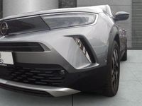 Gebraucht Opel Mokka Elegance 131 PS (96 kW) 2023 Kontrast grau/quarz silber SUV