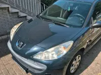 Gebraucht Peugeot 206+ 77 PS (56 kW) 2009 Grau Kleinwagen