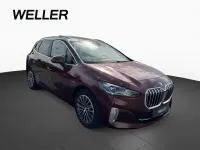 Gebraucht BMW 218 Active Tourer Luxury Line 150 PS (110 kW) 2023 Rot Van / Kleinbus