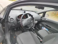 Używany Opel Corsa Edition 60 KM (44 kW) 2009 Czarny Sedan/Limuzyna