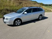 Używany Skoda Superb Ambition 170 KM (125 kW) 2012 Srebrny Kombi