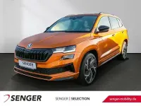 Gebraucht Skoda Karoq SportLine 190 PS (139 kW) 2022 Phoenixorange premium meta... SUV