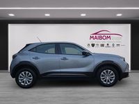 Gebraucht Opel Mokka-e Edition 100 kW (136 PS) 2022 Kontrast grau/quarz silber SUV