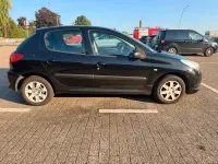 Gebraucht Peugeot 206 73 PS (53 kW) 2011 Schwarz Limousine