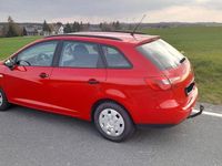 Używany Seat Ibiza 69 KM (50 kW) 2013 Czerwony Sedan/Limuzyna