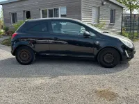 Używany Opel Corsa Satellite 69 KM (50 kW) 2011 Czarny Hatchback