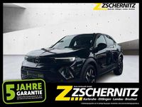 Gebraucht Opel Mokka-e Elegance 100 kW (136 PS) 2023 Lackierung schwarz perla nera/ SUV