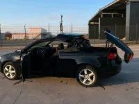 Używany VW Eos 122 KM (89 kW) 2006 Czarny Kabriolet