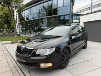 Gebraucht Skoda Superb GreenLine 105 PS (77 kW) 2011 Schwarz Kombi