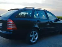 Używany Mercedes C180 Elegance 143 KM (105 kW) 2006 Czarny Kombi