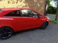 Gebraucht Opel Corsa Color Edition 90 PS (66 kW) 2010 Rot Kleinwagen