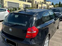 Gebraucht BMW 116 122 PS (89 kW) 2009 Schwarz Kleinwagen