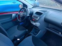 Gebraucht Toyota Aygo 68 PS (50 kW) 2007 Rot Kleinwagen