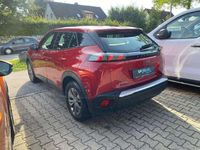 Gebraucht Peugeot e-2008 Active 100 kW (136 PS) 2021 Elixier rot met. SUV