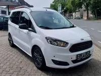 Gebraucht Ford Tourneo Courier Sport 101 PS (74 kW) 2017 Frostweiß Van / Kleinbus