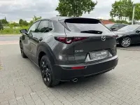 Gebraucht Mazda CX-30 Homura-Line 122 PS (89 kW) 2023 Machine grey (metallic) SUV