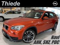Gebraucht BMW X1 Shadowline 184 PS (135 kW) 2014 Valencia orange metallic SUV