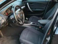 Second-hand BMW 116 122 CP (89 kW) 2010 Negru Hatchback