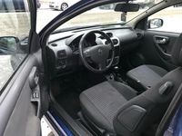 Używany Opel Corsa 89 KM (65 kW) 2006 Niebieski Hatchback