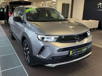 Gebraucht Opel Mokka Elegance 101 PS (74 kW) 2023 Kontrast grau/quarz silber SUV