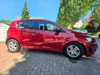 Gebraucht Chevrolet Aveo LT 101 PS (74 kW) 2011 Rot Limousine