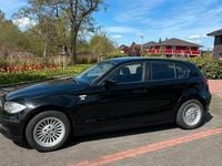 Second-hand BMW 116 122 CP (89 kW) 2009 Negru Hatchback