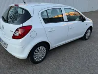 Używany Opel Corsa Selection 69 KM (50 kW) 2011 Biały Hatchback