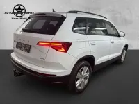 Gebraucht Skoda Karoq 150 PS (110 kW) 2023 Moonweiss metallic (metallic) SUV