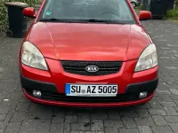Używany Kia Rio 90 KM (66 kW) 2009 Czerwony Hatchback