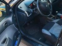 Gebraucht Peugeot 206+ 73 PS (53 kW) 2012 Schwarz Kleinwagen