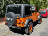 Gebraucht Jeep Wrangler 184 PS (135 kW) 1994 Orange SUV