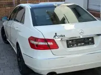 Second-hand Mercedes E200 Avantgarde 184 CP (135 kW) 2011 Alb Berlinǎ