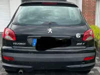Używany Peugeot 206 75 KM (55 kW) 2009 Czarny Sedan/Limuzyna
