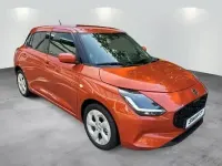 Neu Suzuki Swift Comfort 83 PS (61 kW) 2026 Flame orange pearl metallic Limousine