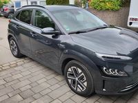 gebraucht Hyundai Kona ELEKTRO 150kW Prime /Sitzpaket/HUD/LED/WP