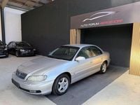 Second-hand Opel Omega 144 CP (105 kW) 2000 Argintiu Berlinǎ