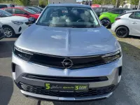 Gebraucht Opel Mokka 131 PS (96 kW) 2023 Kontrast grau/quarz silber SUV