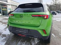 Gebraucht Opel Mokka 131 PS (96 kW) 2024 Ikone grün metallic SUV