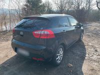 Gebraucht Kia Rio 109 PS (80 kW) 2011 Schwarz Kleinwagen