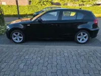 Gebraucht BMW 116 122 PS (89 kW) 2009 Schwarz Kleinwagen