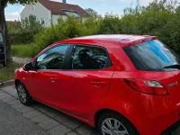 Gebraucht Mazda 2 75 PS (55 kW) 2011 Rot Kleinwagen